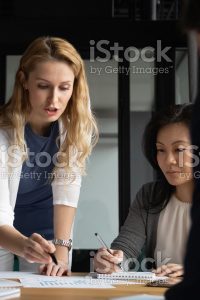 woman mentoring another woman